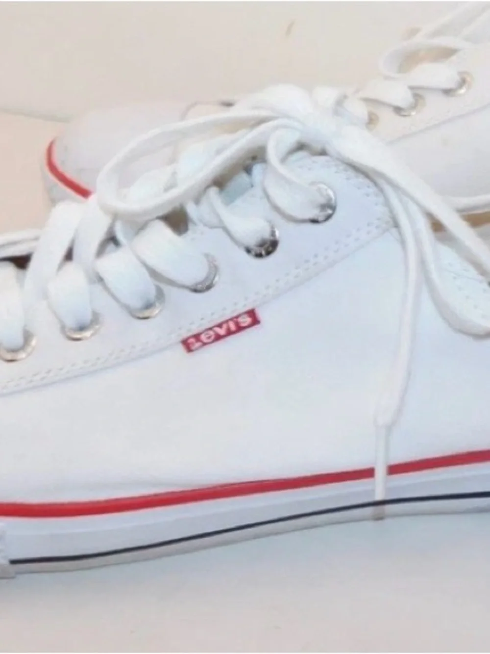 Levi's White Low-Top Sneakers with Red Stripe and Tan Heel Patch